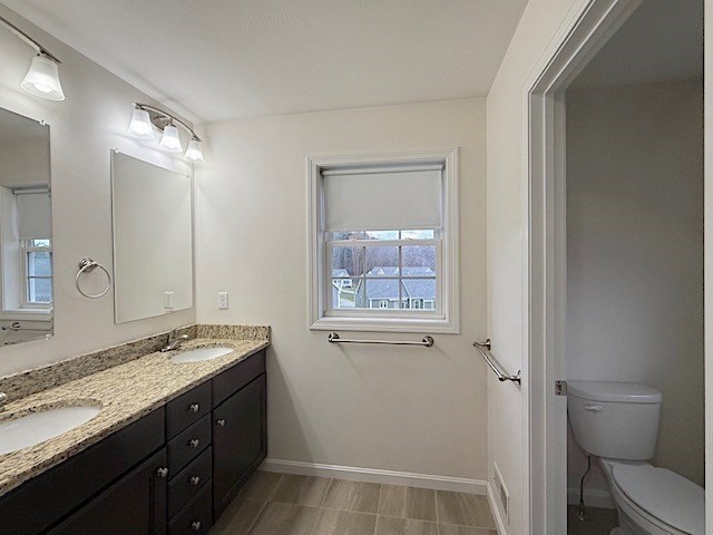 121 Robin Hill Road, Unit B Groton, MA 01450 - Photo 12 of 18 a bathroom with a granite countertop sink toilet and shower