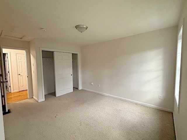 121 Robin Hill Road, Unit B Groton, MA 01450 - Photo 16 of 18 an empty room with closet area