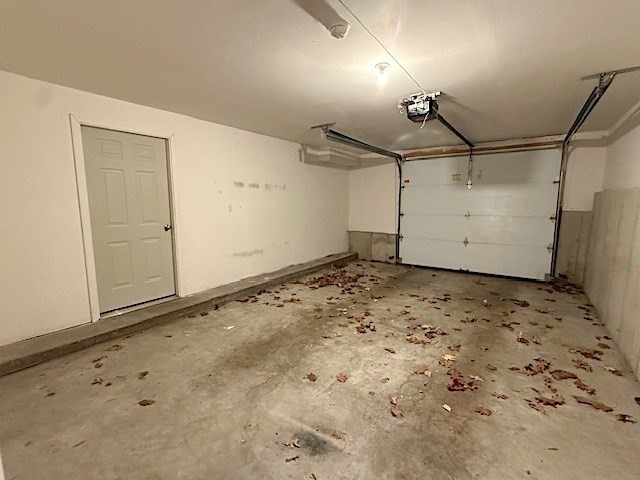 121 Robin Hill Road, Unit B Groton, MA 01450 - Photo 18 of 18 a view of a garage