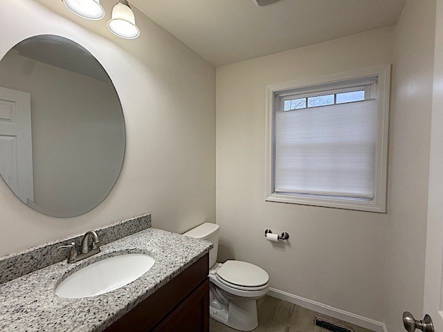 121 Robin Hill Road, Unit B Groton, MA 01450 - Photo 9 of 18 a bathroom with a granite countertop sink toilet and a mirror