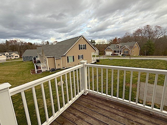 121 Robin Hill Road, Unit B Groton, MA 01450 - Photo 10 of 18 a view of a house with a balcony