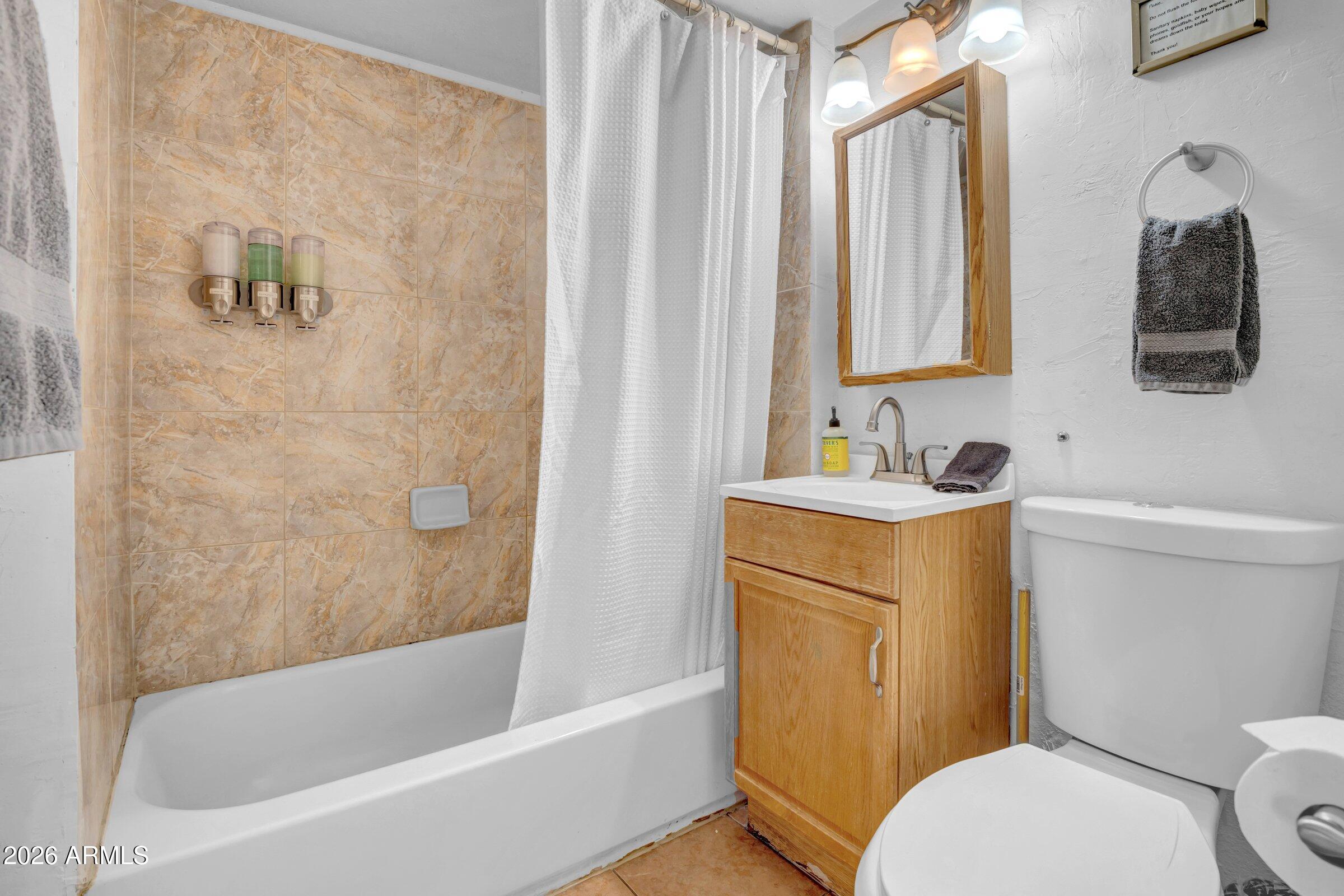 712 East Pierce Street Phoenix, AZ 85006 - Photo 32 of 39 a bathroom with a sink toilet and shower