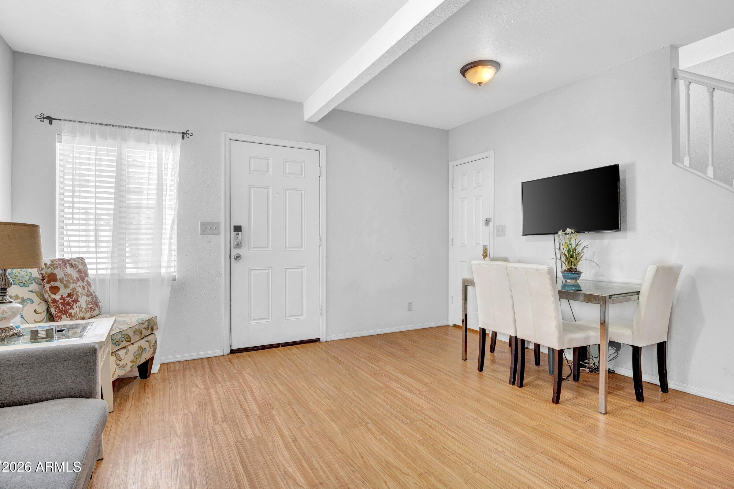 712 East Pierce Street Phoenix, AZ 85006 - Photo 33 of 39 a view of a livingroom with furniture and a flat screen tv