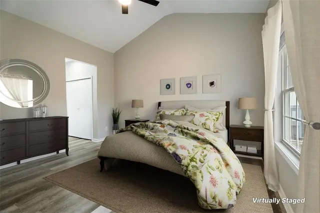 a bedroom with a bed and a dresser