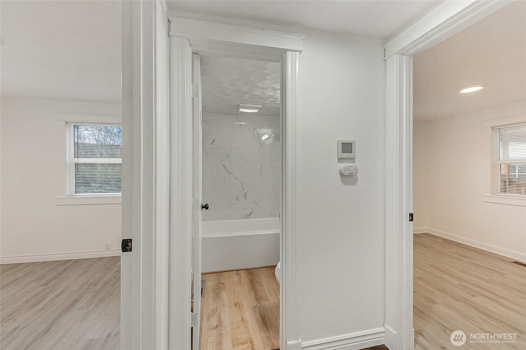 1607 Harrison Street Steilacoom, WA 98388 - Photo 14 of 37 a view of a bathroom from a hallway