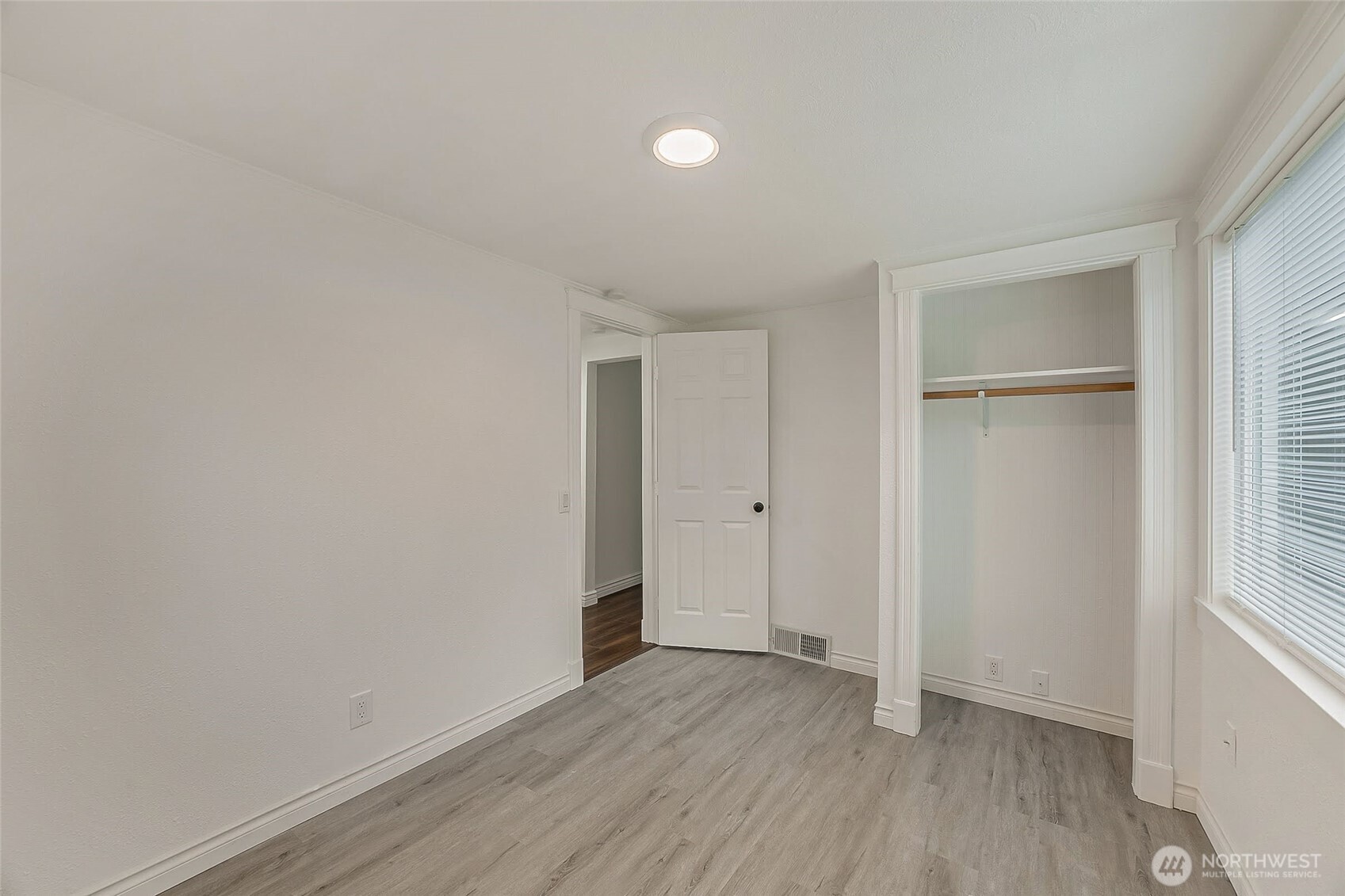 1607 Harrison Street Steilacoom, WA 98388 - Photo 16 of 37 a view of an empty room with closet and a window