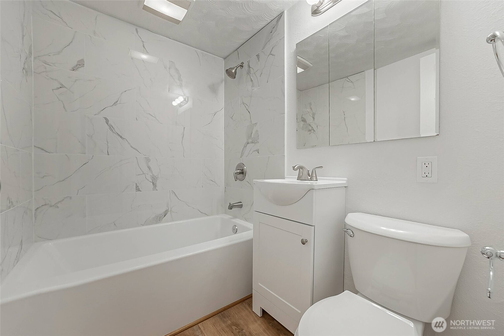 1607 Harrison Street Steilacoom, WA 98388 - Photo 19 of 37 a bathroom with a sink a toilet and bathtub