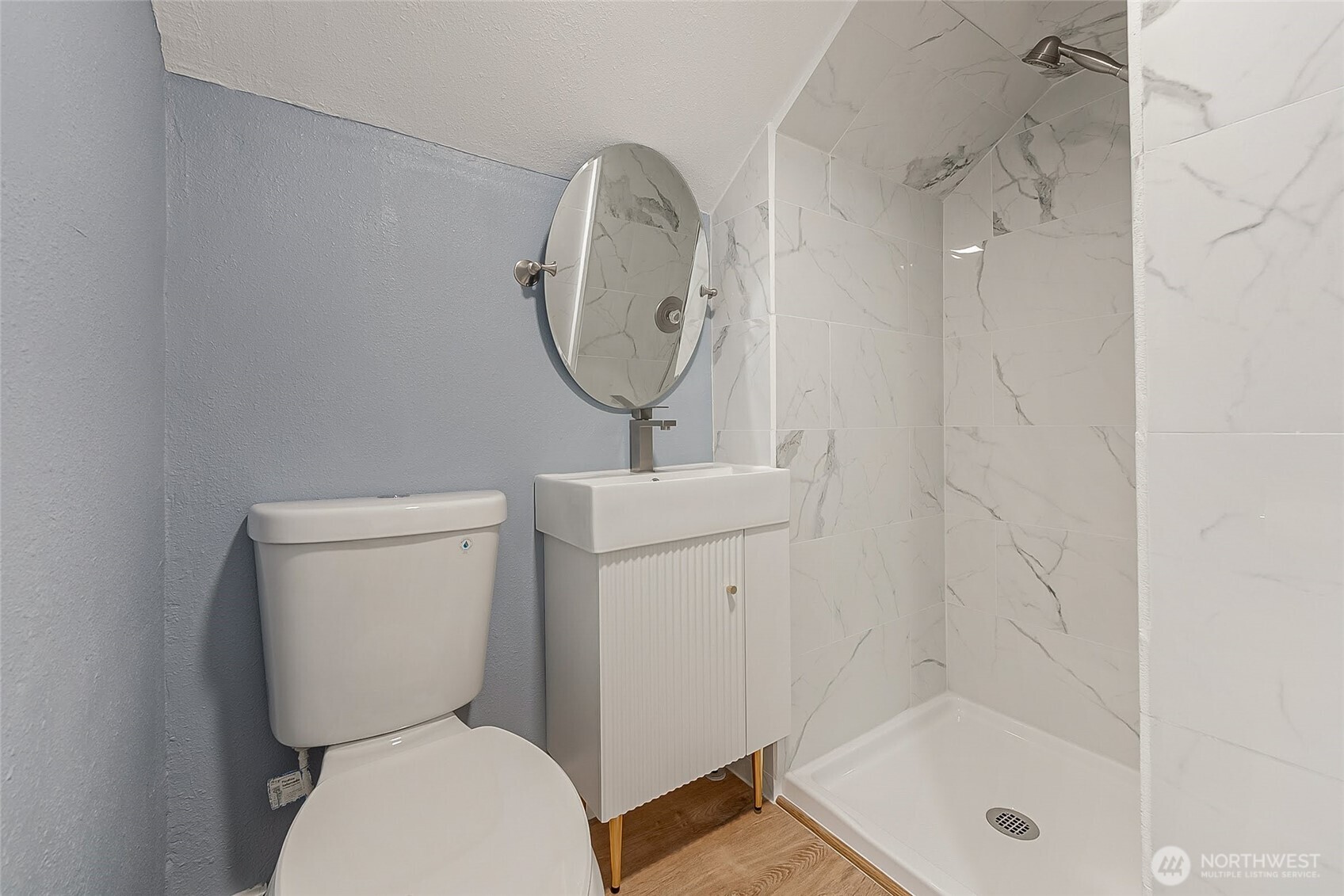 1607 Harrison Street Steilacoom, WA 98388 - Photo 26 of 37 a bathroom with a toilet a sink and a shower