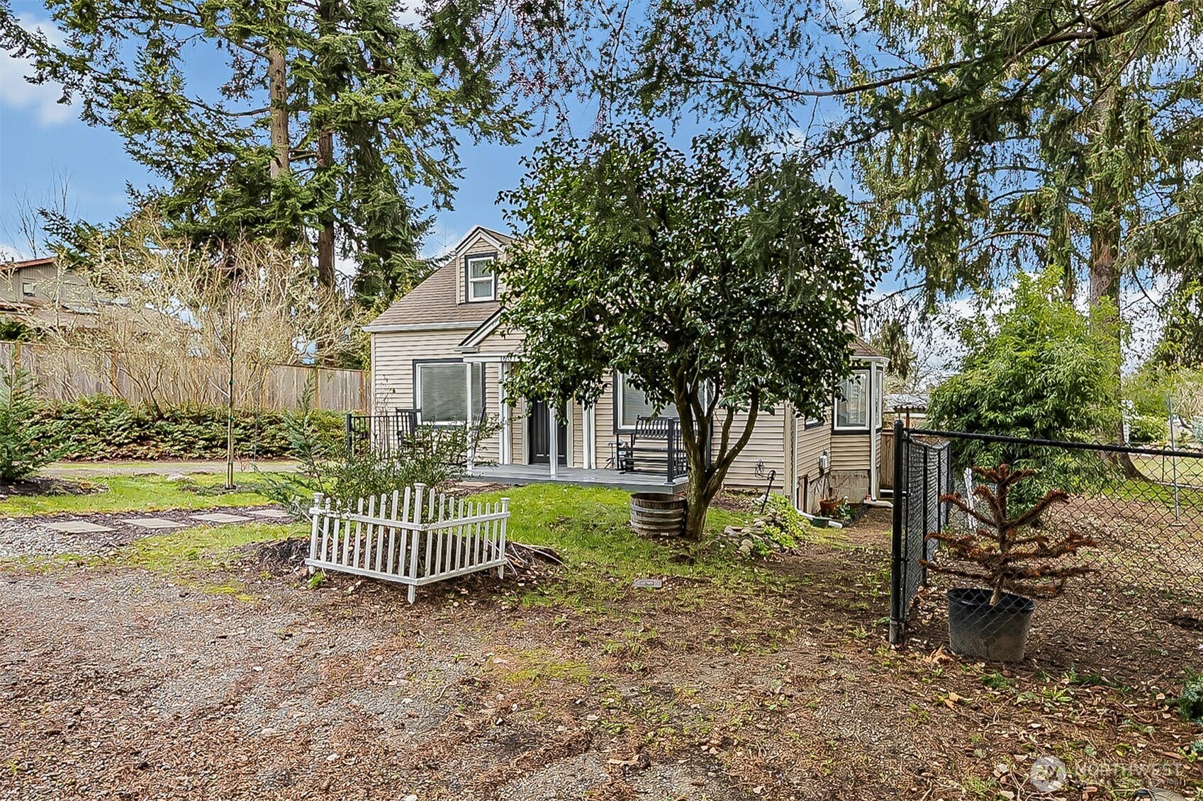1607 Harrison Street Steilacoom, WA 98388 - Photo 3 of 37 a view of a house with backyard and a tree