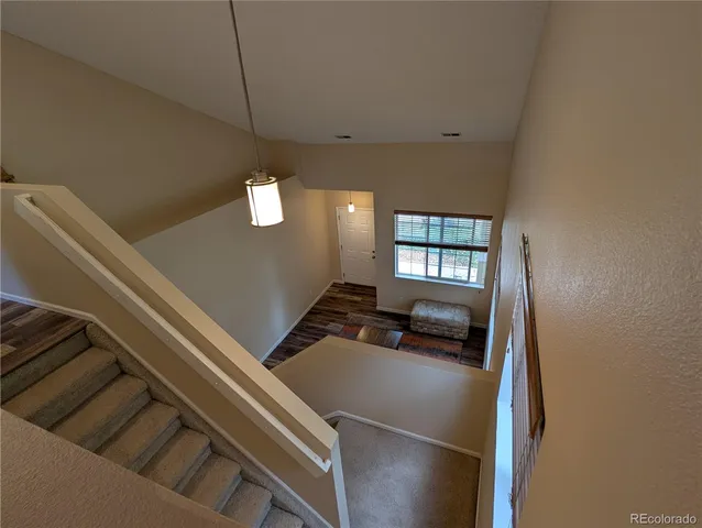 a view of a livingroom with furniture