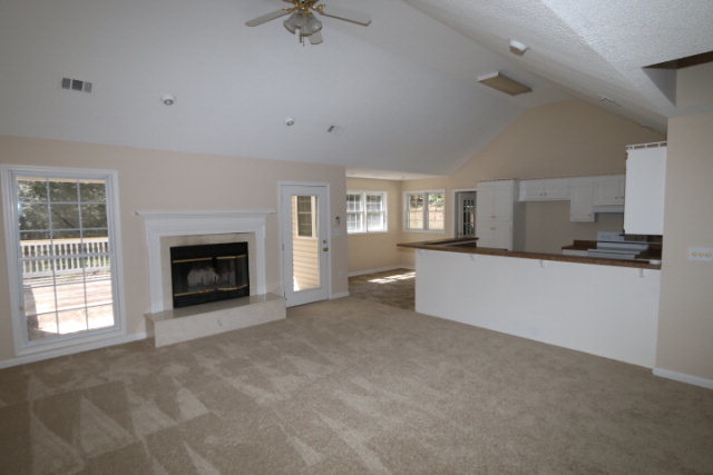 1644 Klopfer Road Juliette, GA 31046 - Photo 14 of 16 a view of a livingroom with a fireplace and a window