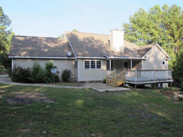 1644 Klopfer Road Juliette, GA 31046 - Photo 15 of 16 a view of a house with a yard and sitting area