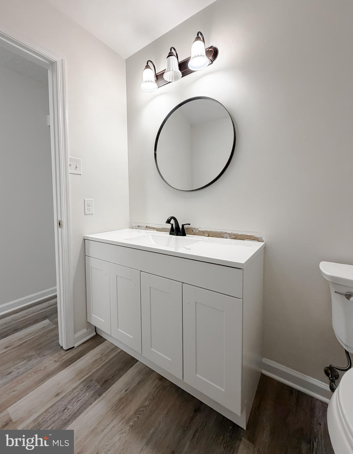 39655 Persimmon Creek Road Mechanicsville, MD 20659 - Photo 11 of 35 Hall Bathroom with New Vanity and Toilet