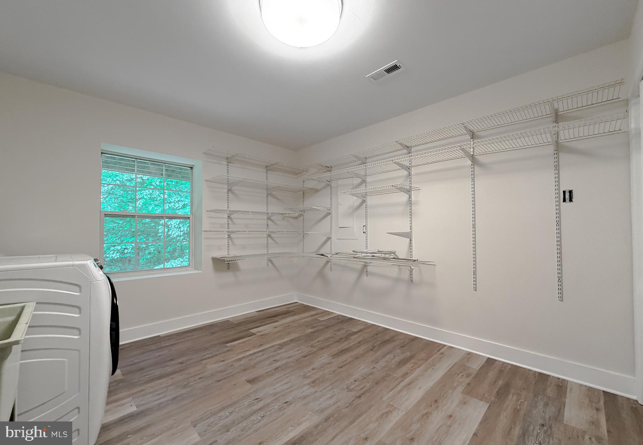 39655 Persimmon Creek Road Mechanicsville, MD 20659 - Photo 25 of 35 Laundry / Utility Room with Storage Space