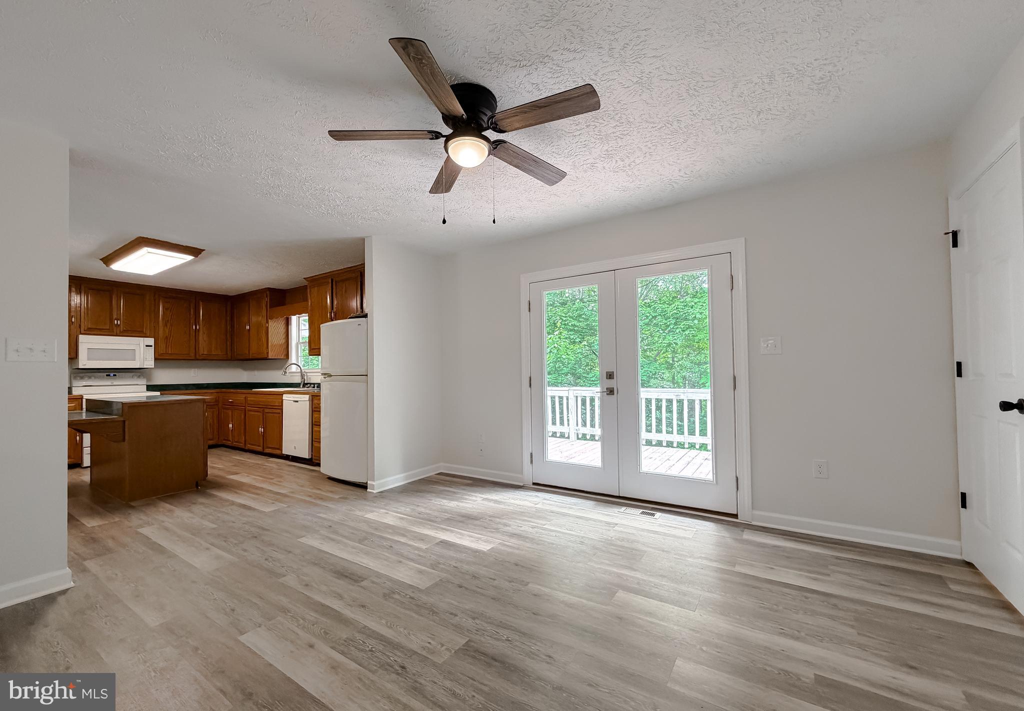39655 Persimmon Creek Road Mechanicsville, MD 20659 - Photo 5 of 35 Dining Room with Doors to Deck