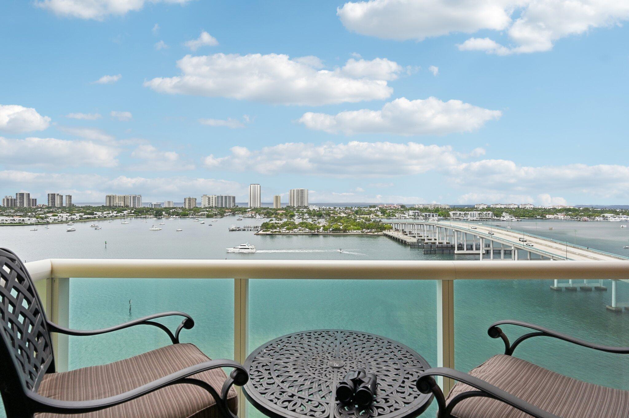 2640 Lake Shore Drive, Unit 1510 Riviera Beach, FL 33404 - Photo 1 of 52 a view of a chairs in a balcony
