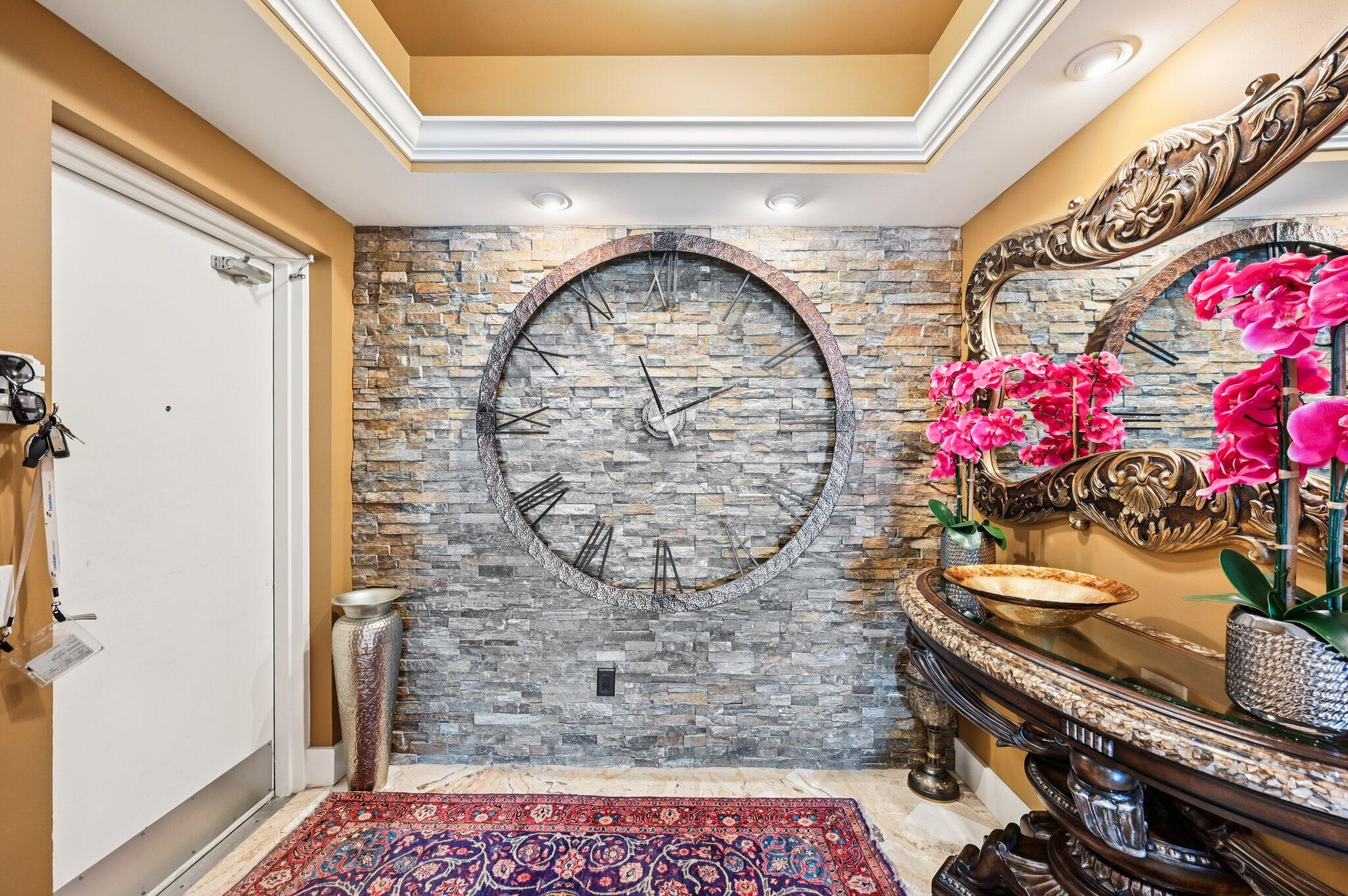2640 Lake Shore Drive, Unit 1510 Riviera Beach, FL 33404 - Photo 28 of 52 a view of entryway with a flower pot and a shower