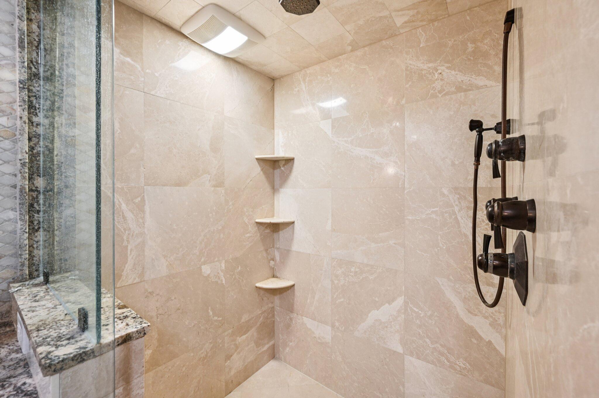 2640 Lake Shore Drive, Unit 1510 Riviera Beach, FL 33404 - Photo 33 of 52 a bathroom with a shower