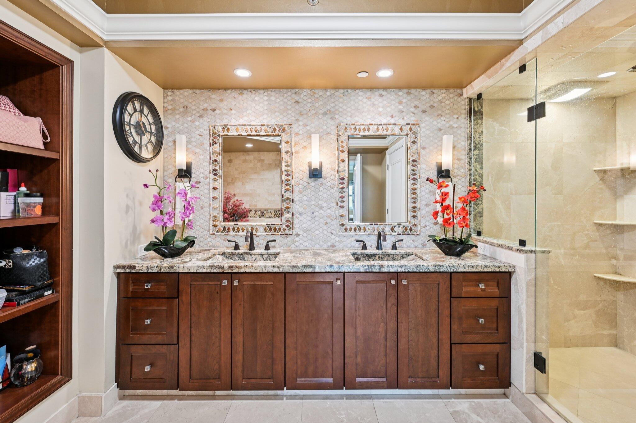 2640 Lake Shore Drive, Unit 1510 Riviera Beach, FL 33404 - Photo 34 of 52 a bathroom with a sink and a mirror