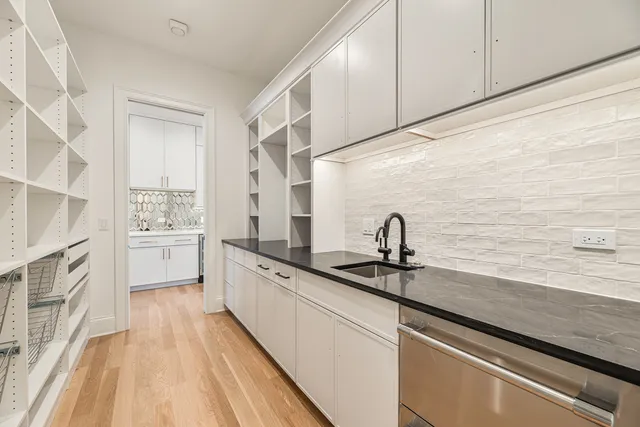 a bathroom with a sink and a shower