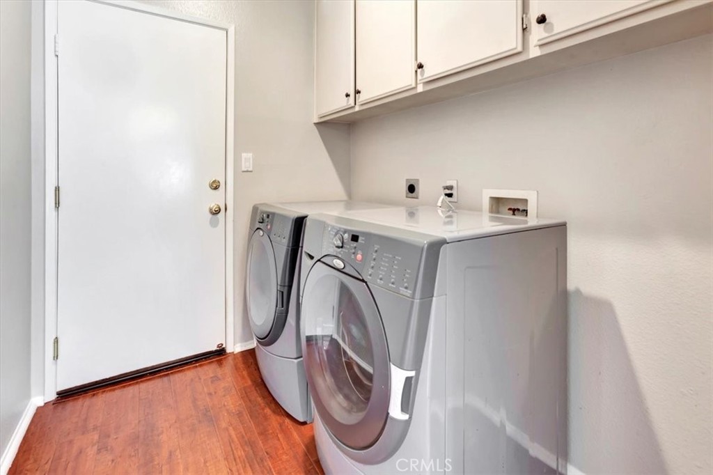 17 Marquesa Dana Point, CA 92629 - Photo 18 of 20 a utility room with dryer and washer