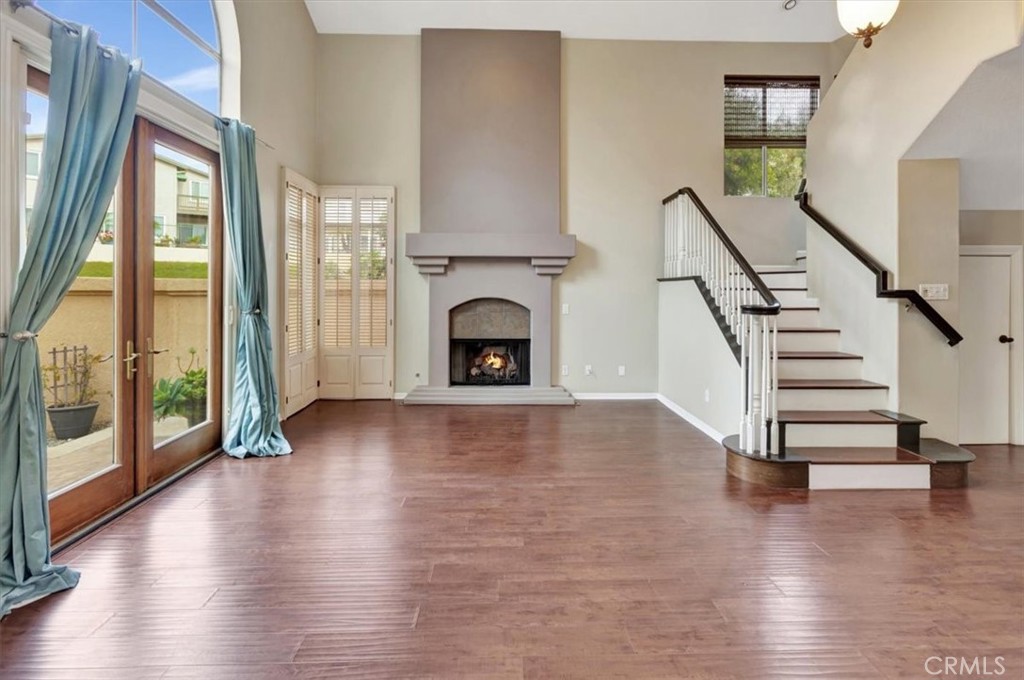 17 Marquesa Dana Point, CA 92629 - Photo 3 of 20 a view of empty room with wooden floor and floor to ceiling window