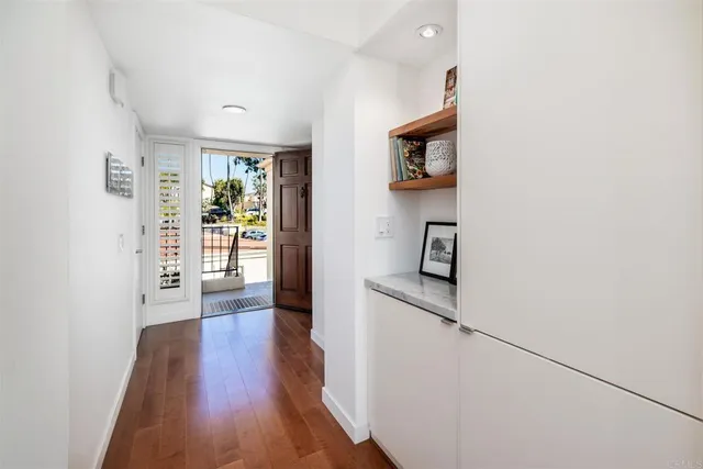 wooden floor in a hall with an entryway and wooden floor