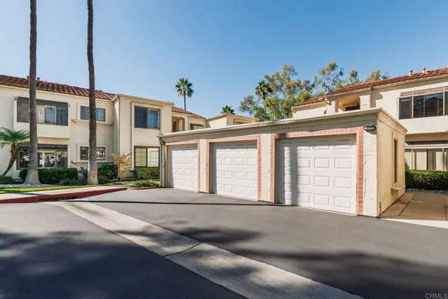 a front view of a building with a road