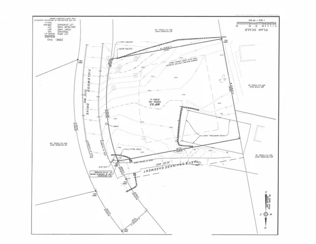 a picture of a bathroom with a shower