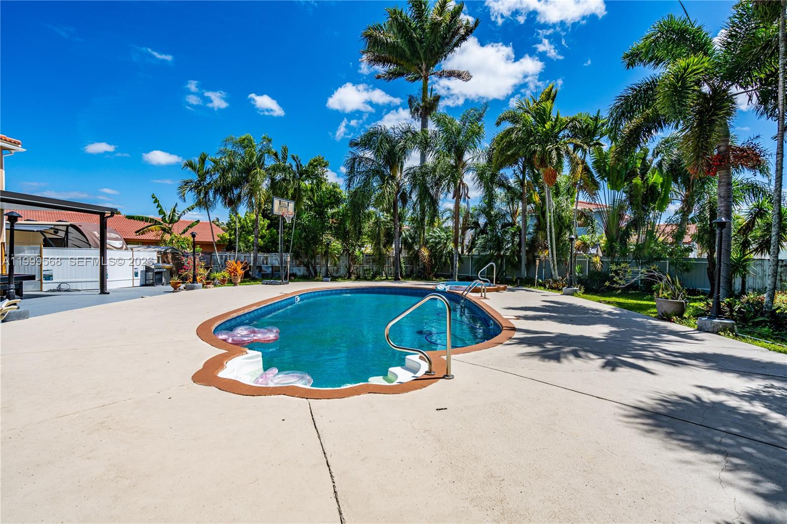 13790 Southwest 174th Street Miami, FL 33177 - Photo 29 of 41 a view of outdoor space and swimming pool