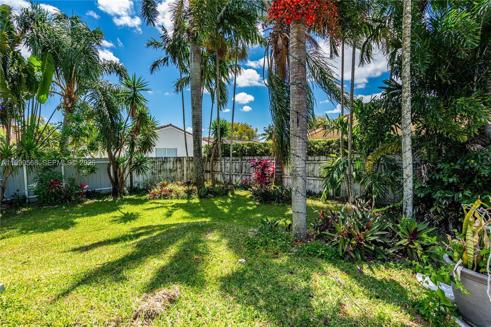 13790 Southwest 174th Street Miami, FL 33177 - Photo 30 of 41 a view of a yard in front of a house