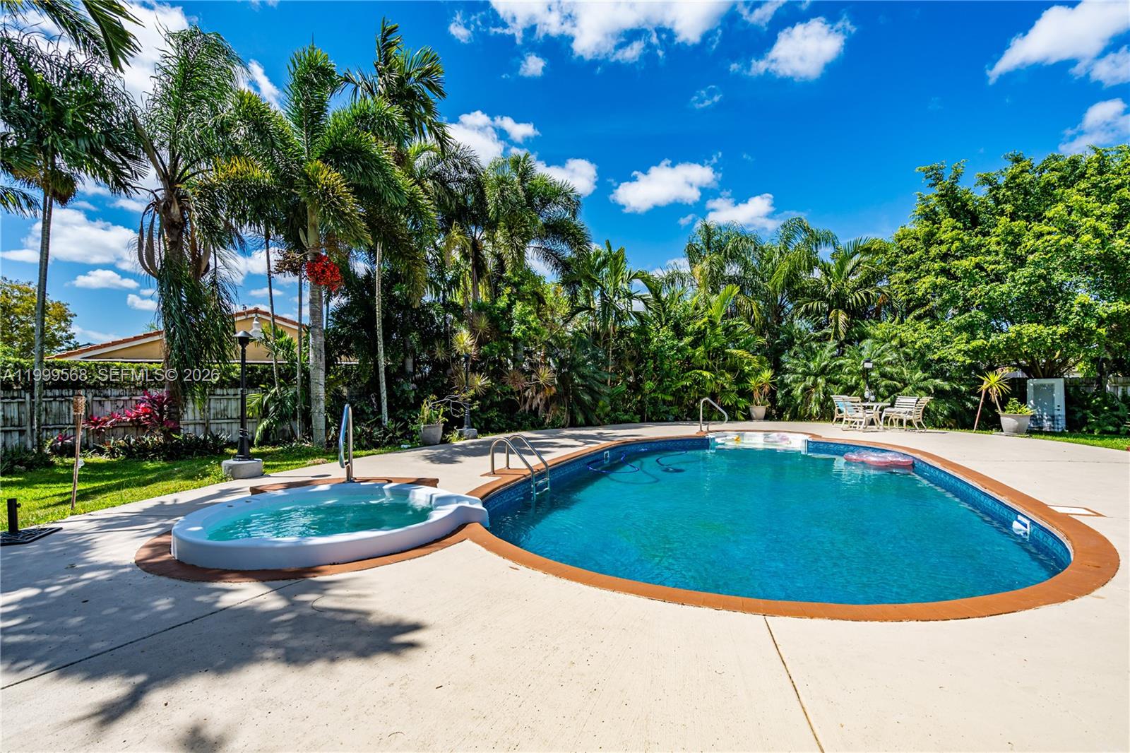 13790 Southwest 174th Street Miami, FL 33177 - Photo 34 of 41 a view of a swimming pool with a yard