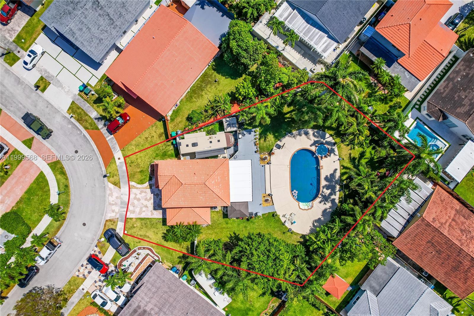 13790 Southwest 174th Street Miami, FL 33177 - Photo 39 of 41 an aerial view of a house with a yard and garden