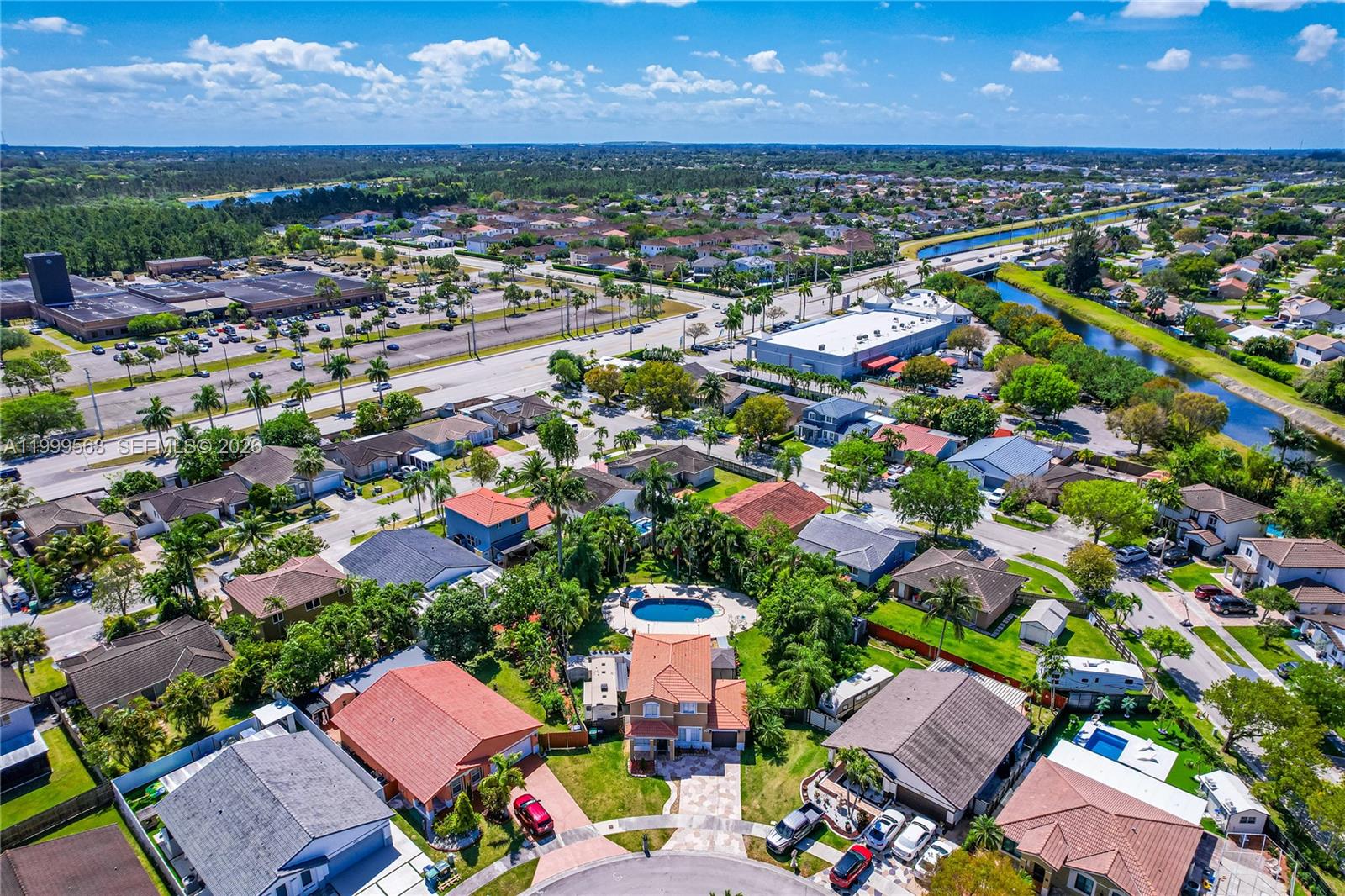 13790 Southwest 174th Street Miami, FL 33177 - Photo 5 of 41 an aerial view of residential houses with outdoor space and trees