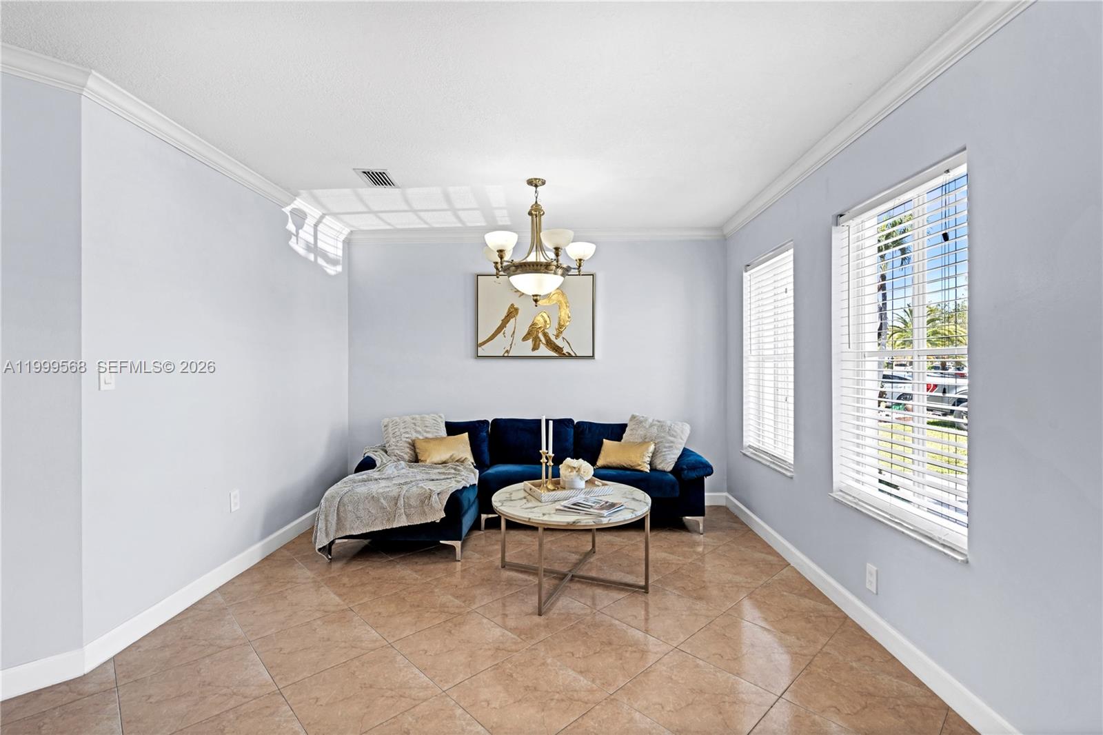 13790 Southwest 174th Street Miami, FL 33177 - Photo 10 of 41 a living room with furniture and a window