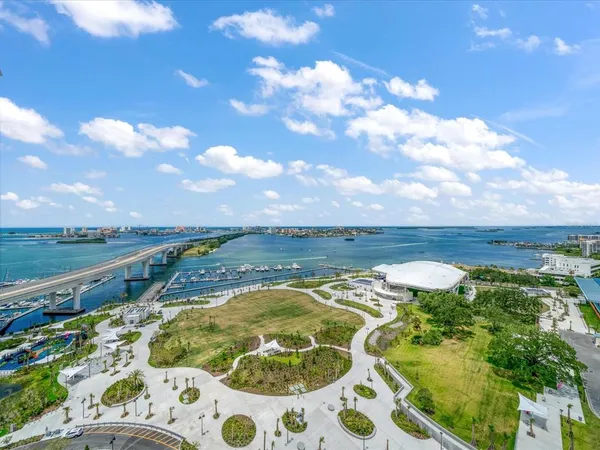 a view of a lake with a yard