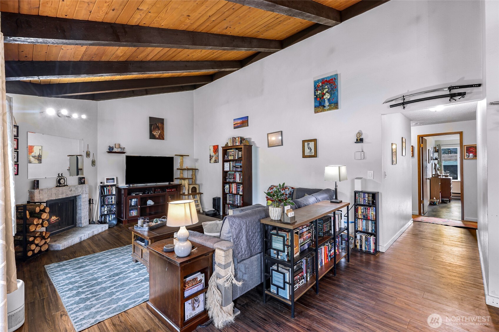 1730 Southwest 318th Place, Unit 39D Federal Way, WA 98023 - Photo 11 of 36 a living room with furniture and a flat screen tv