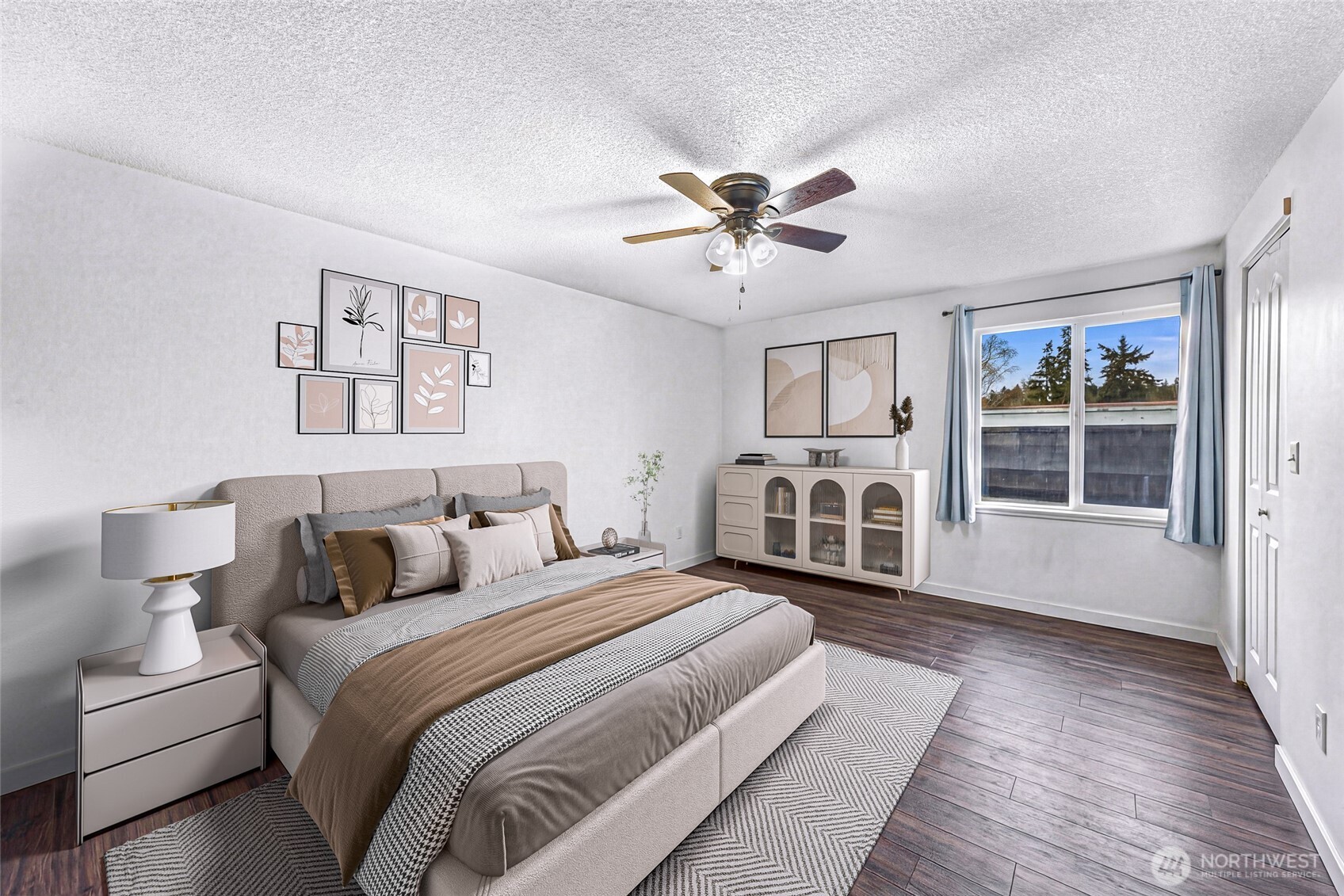 1730 Southwest 318th Place, Unit 39D Federal Way, WA 98023 - Photo 23 of 36 a bedroom with a large bed and a window