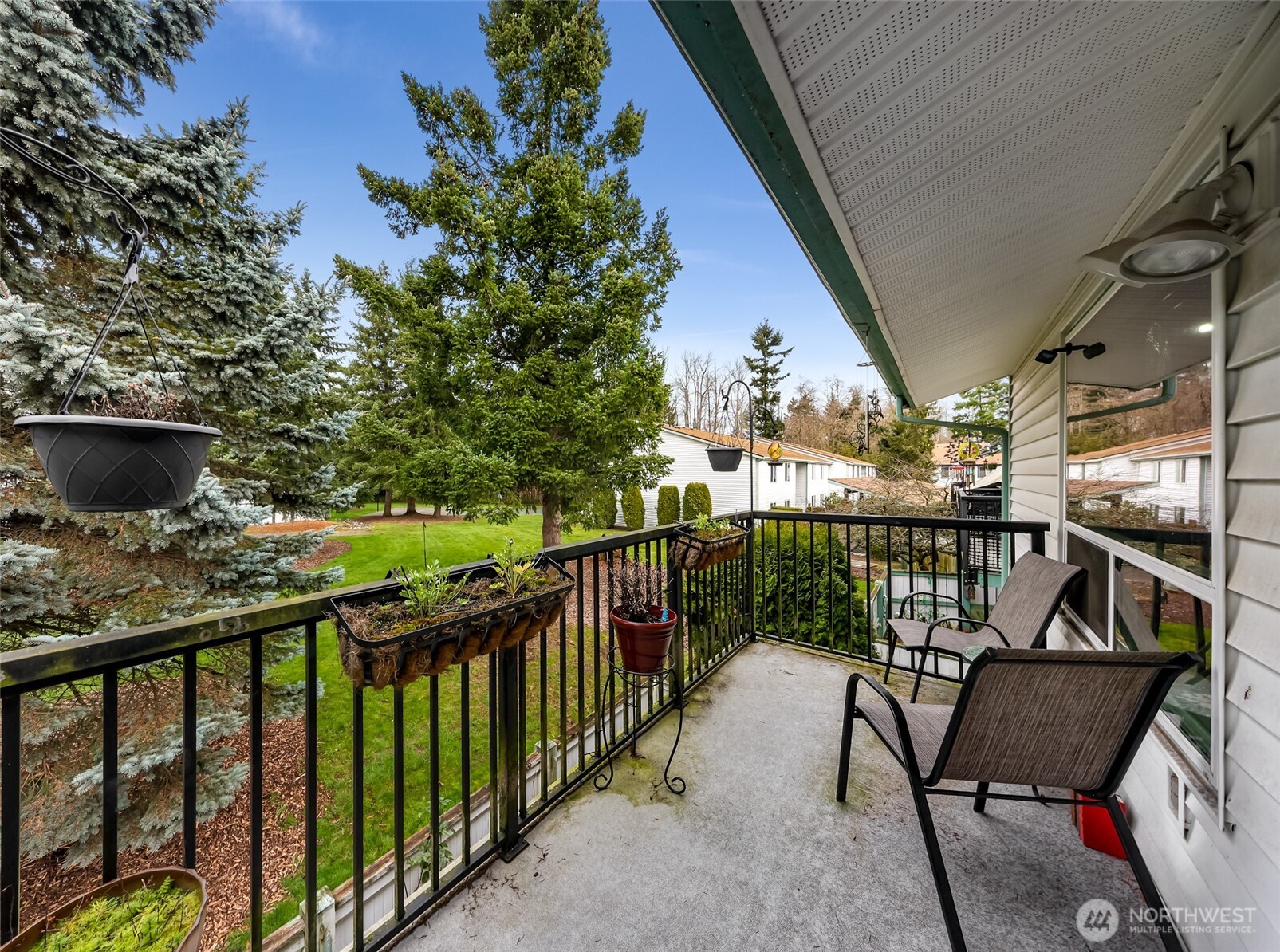 1730 Southwest 318th Place, Unit 39D Federal Way, WA 98023 - Photo 28 of 36 a view of a balcony with furniture