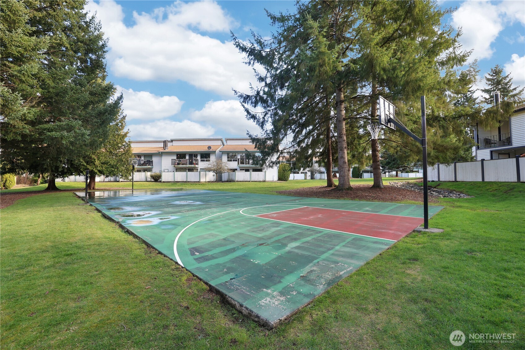 1730 Southwest 318th Place, Unit 39D Federal Way, WA 98023 - Photo 31 of 36 a view of a playground with basketball court