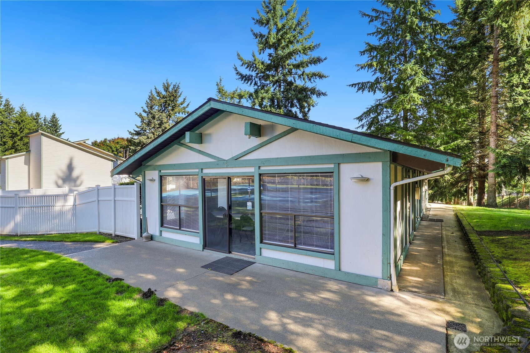 1730 Southwest 318th Place, Unit 39D Federal Way, WA 98023 - Photo 32 of 36 a view of a house with a yard