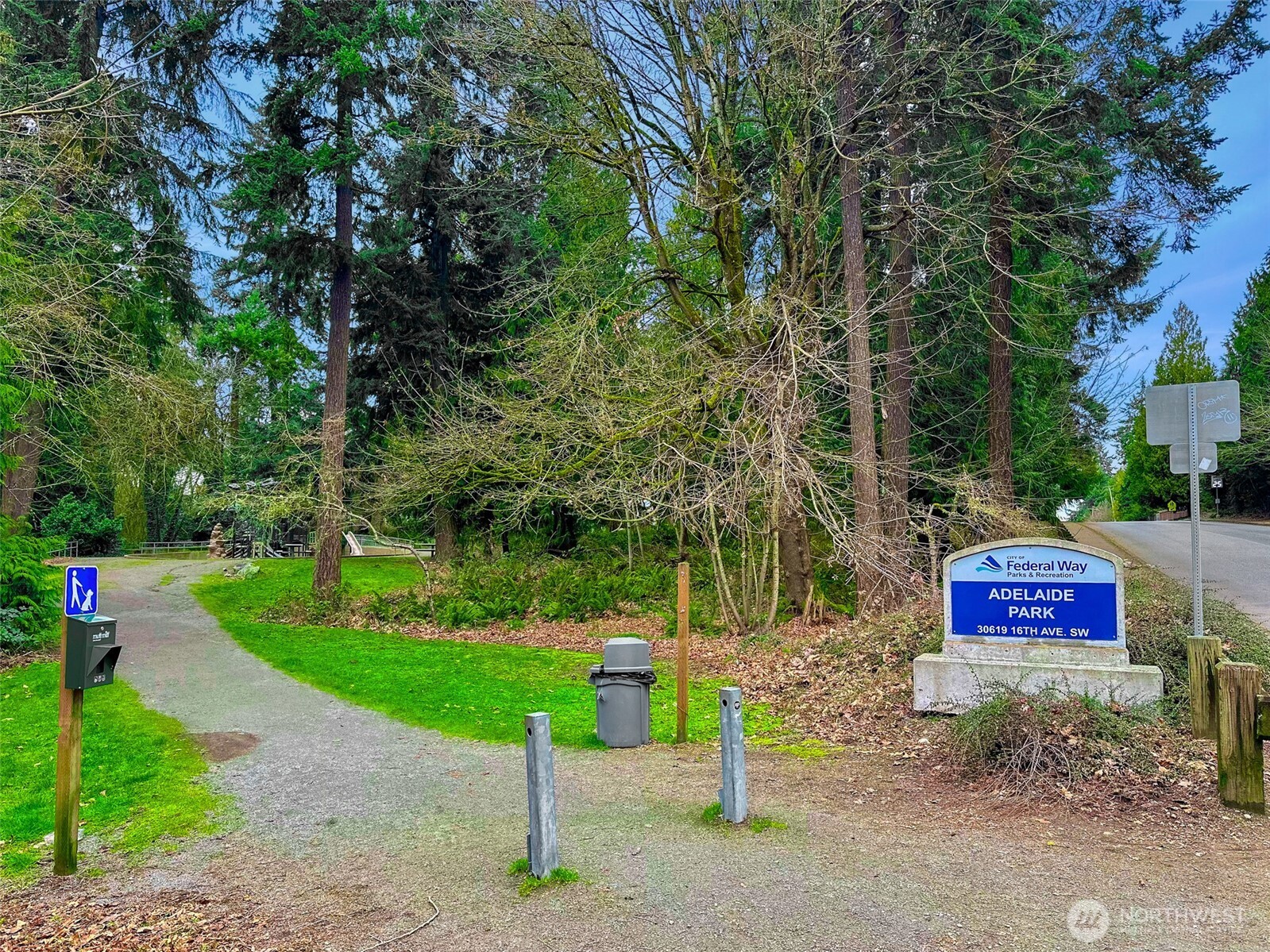 1730 Southwest 318th Place, Unit 39D Federal Way, WA 98023 - Photo 33 of 36 a front view of a house with a yard