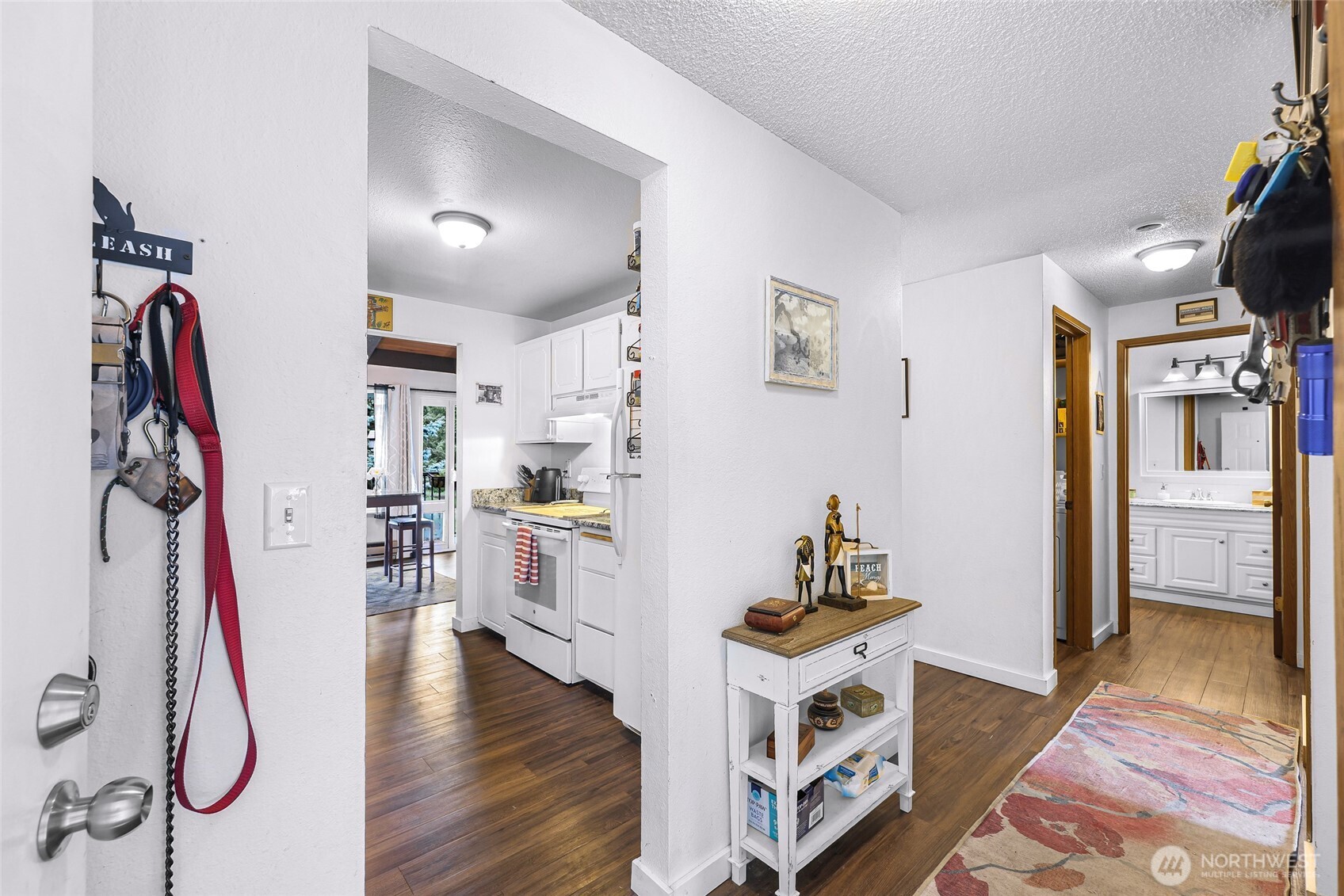 1730 Southwest 318th Place, Unit 39D Federal Way, WA 98023 - Photo 5 of 36 a room with furniture and a wooden floor
