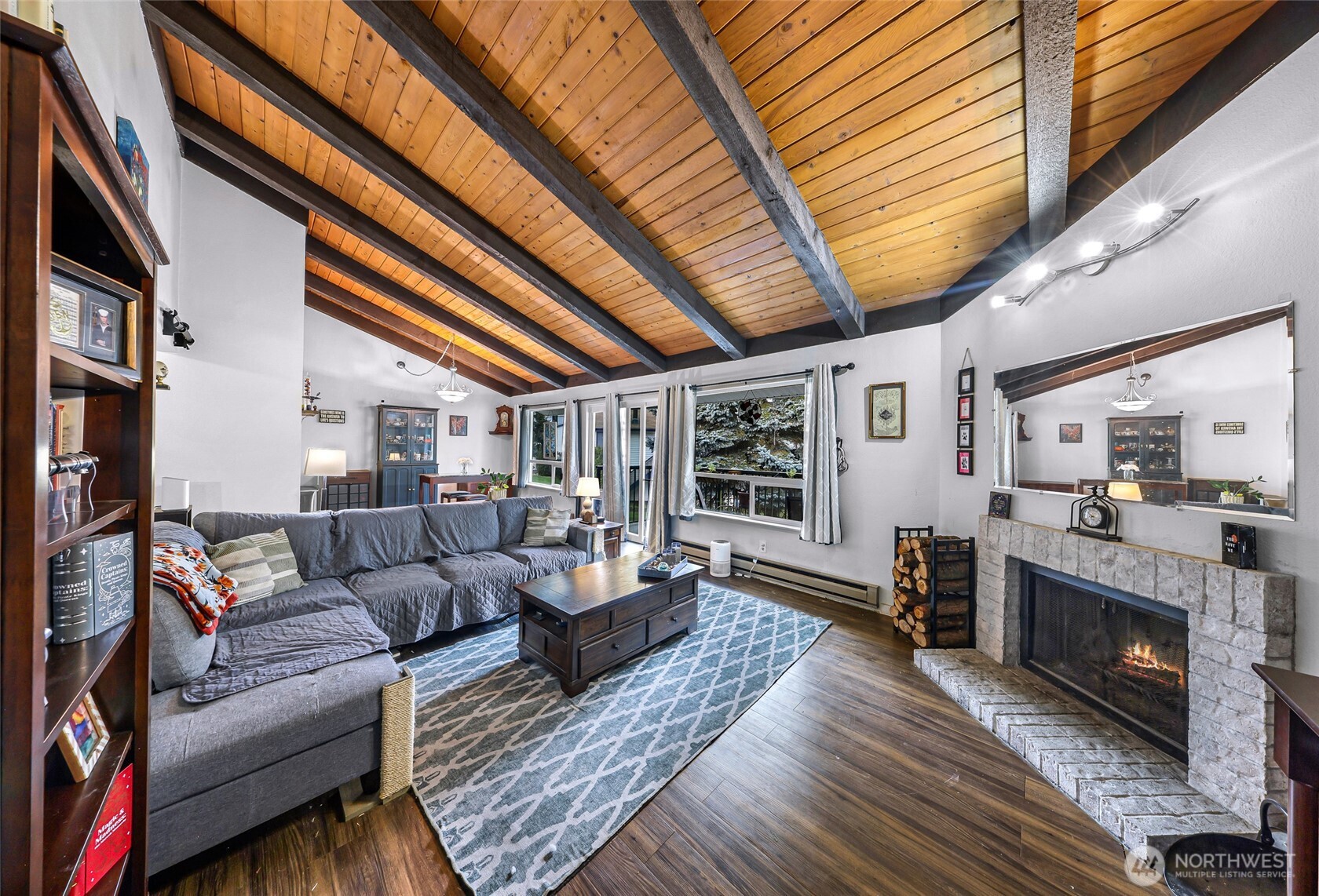 1730 Southwest 318th Place, Unit 39D Federal Way, WA 98023 - Photo 10 of 36 a living room with furniture and a fireplace