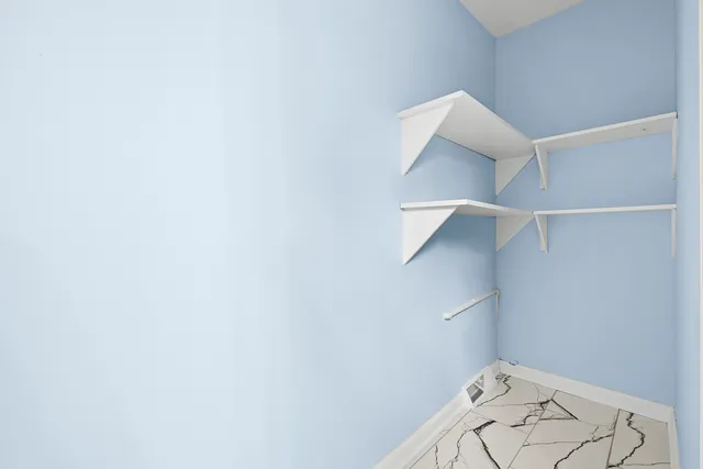 a view of a house with a small yard