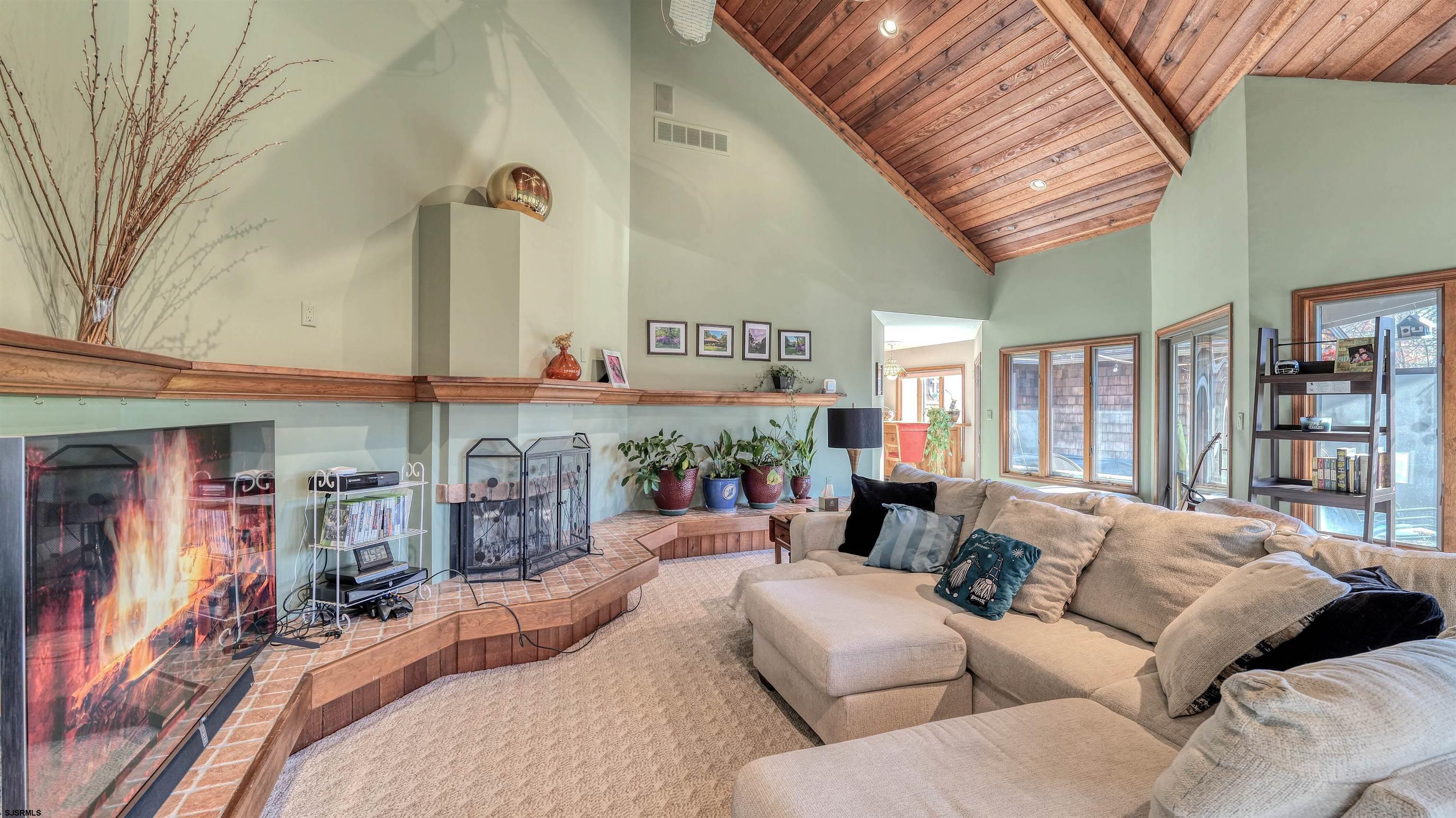 3 School House Road Egg Harbor Township, NJ 08234 - Photo 15 of 56 a bedroom with furniture and a large window