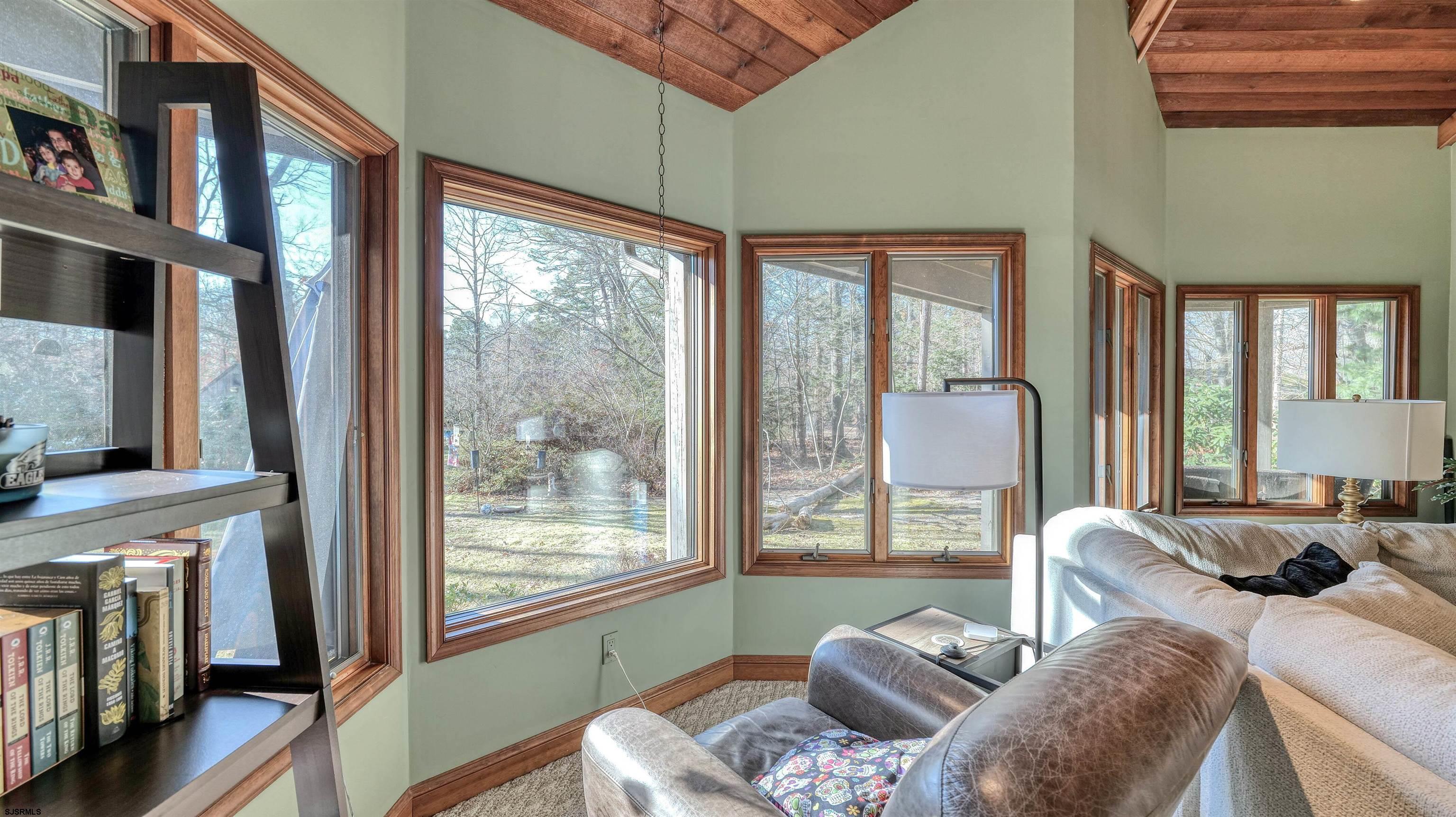 3 School House Road Egg Harbor Township, NJ 08234 - Photo 17 of 56 a living room with furniture and a large window