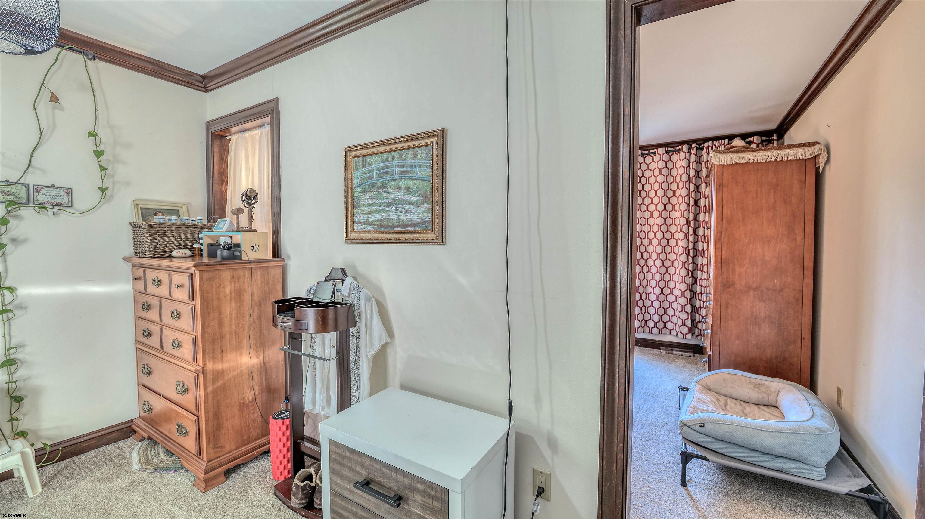 3 School House Road Egg Harbor Township, NJ 08234 - Photo 27 of 56 a view of a bedroom with furniture and windows