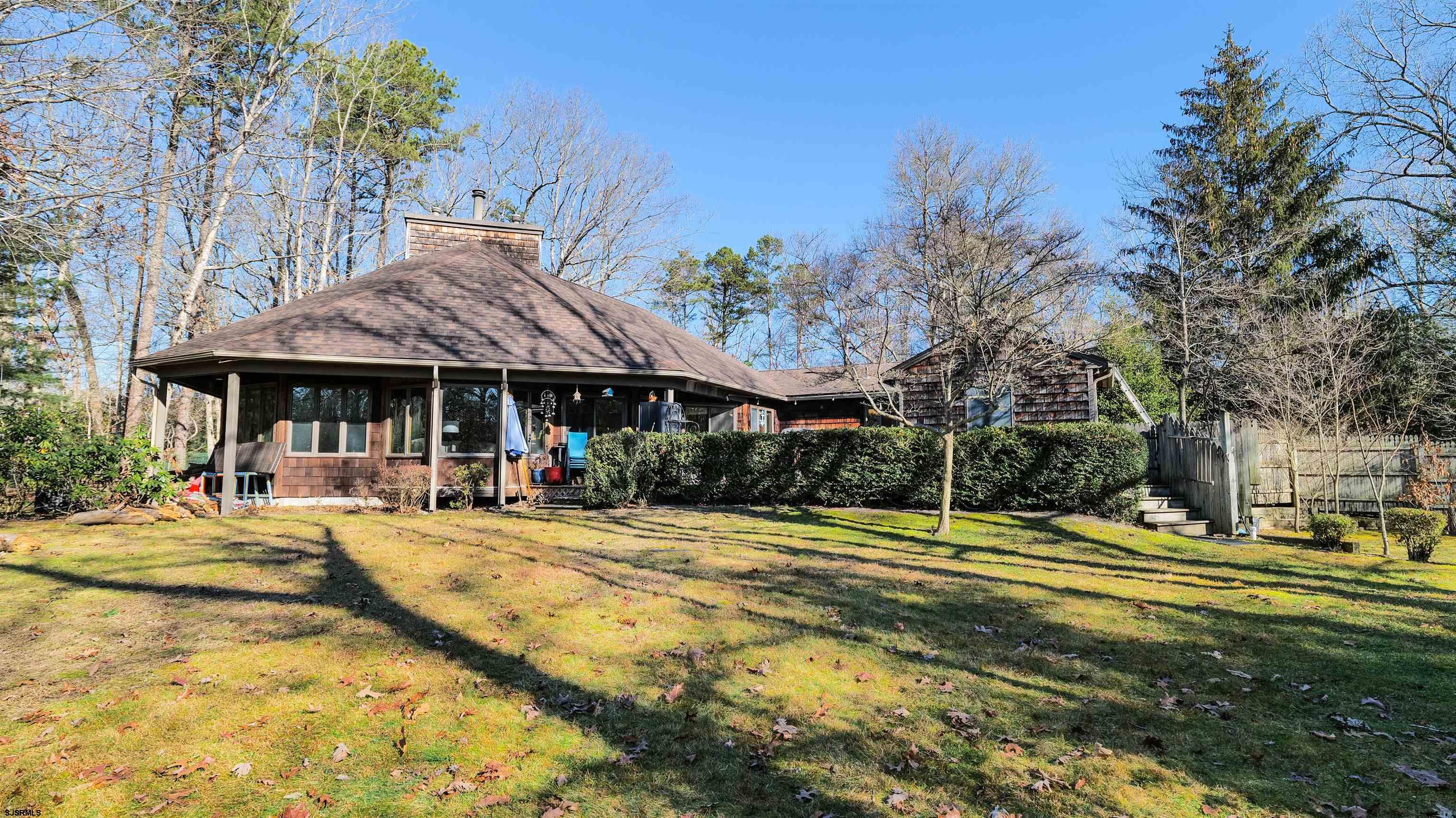 3 School House Road Egg Harbor Township, NJ 08234 - Photo 36 of 56 a view of a swimming pool with sitting area and furniture