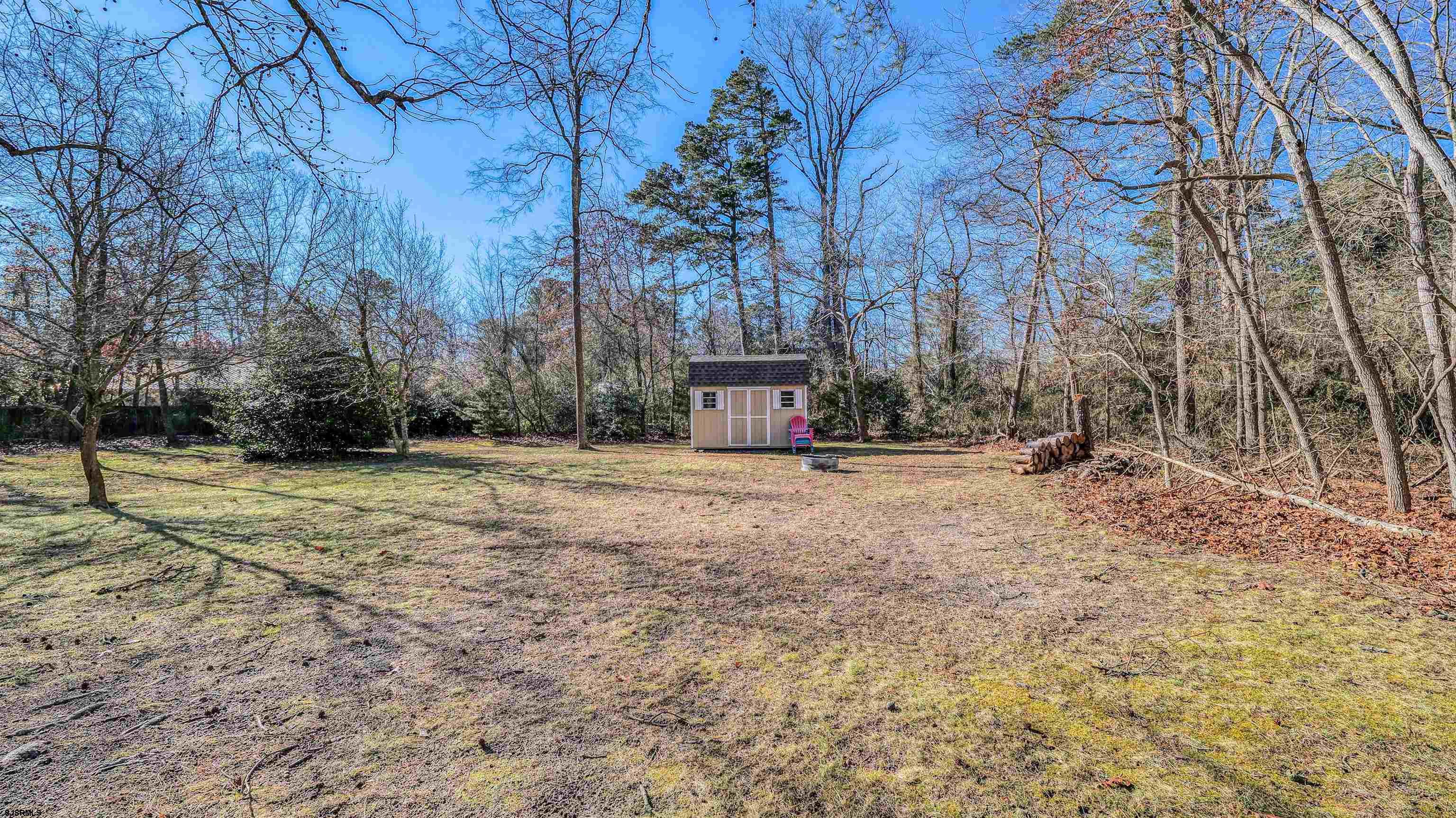 3 School House Road Egg Harbor Township, NJ 08234 - Photo 40 of 56 a view of street with large trees